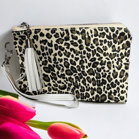 Handbags - Leopard print wristlet with white tassel and wrist loop. New from my Boutique.
